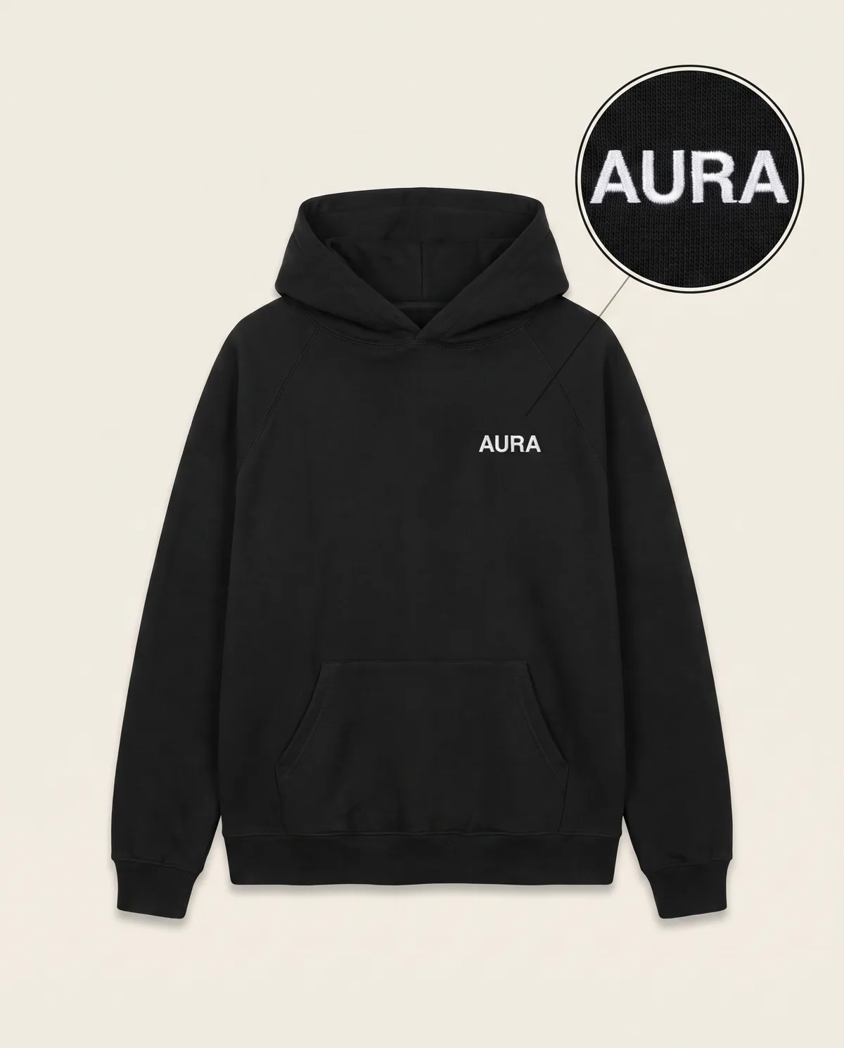 Black heavyweight hoodie, white embroidered AURA sample mark with zoom loupe